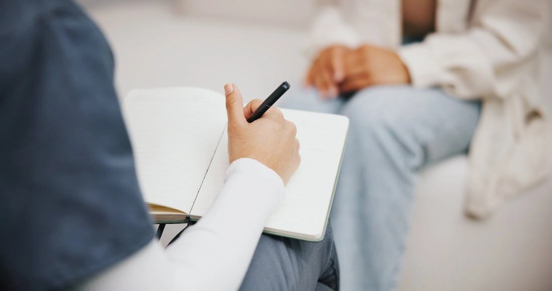 A person participates in therapy in mental health services.