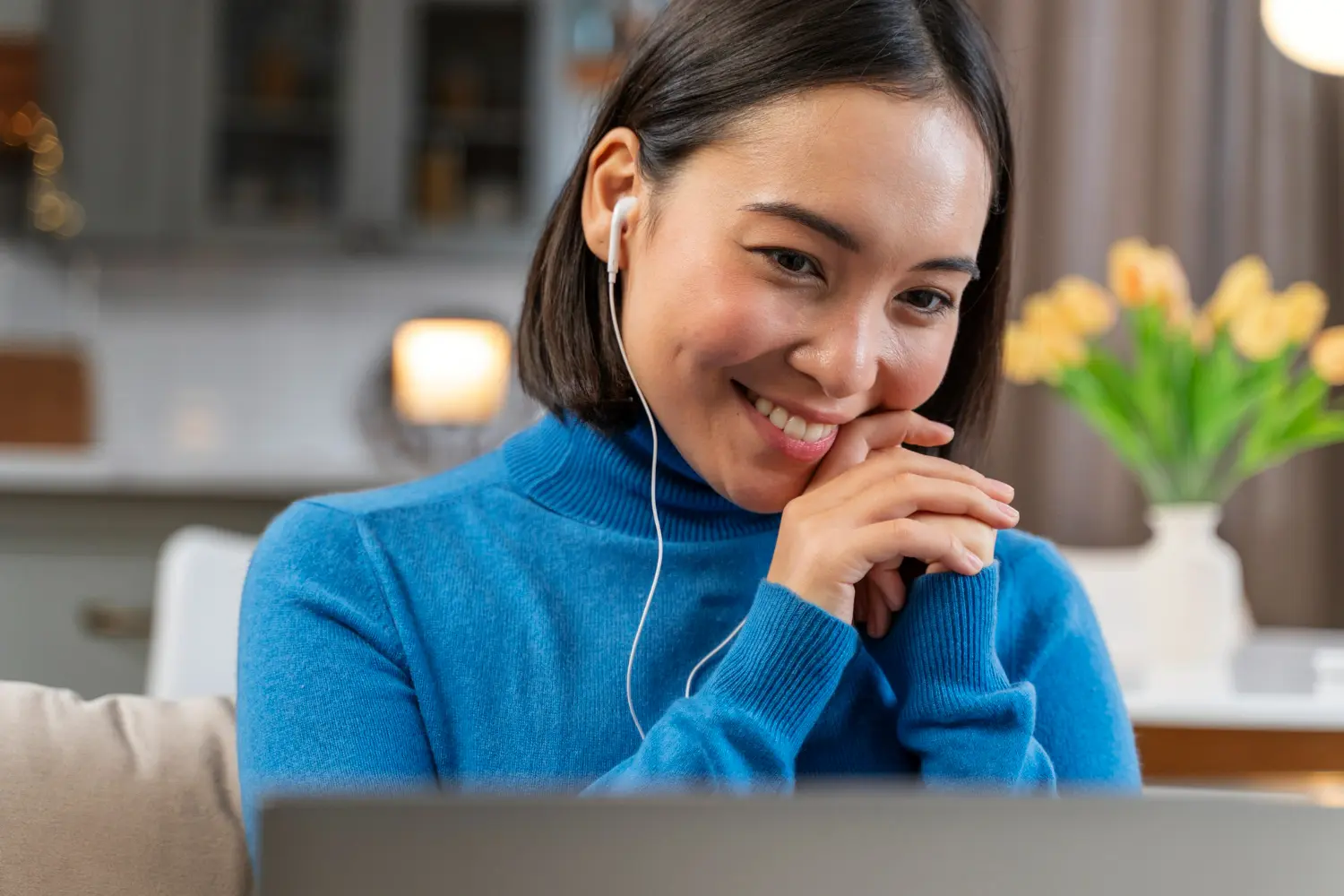 Woman participating in a virtual mental health appointment from home, illustrating access to psychiatric evaluation and medication support through telehealth services