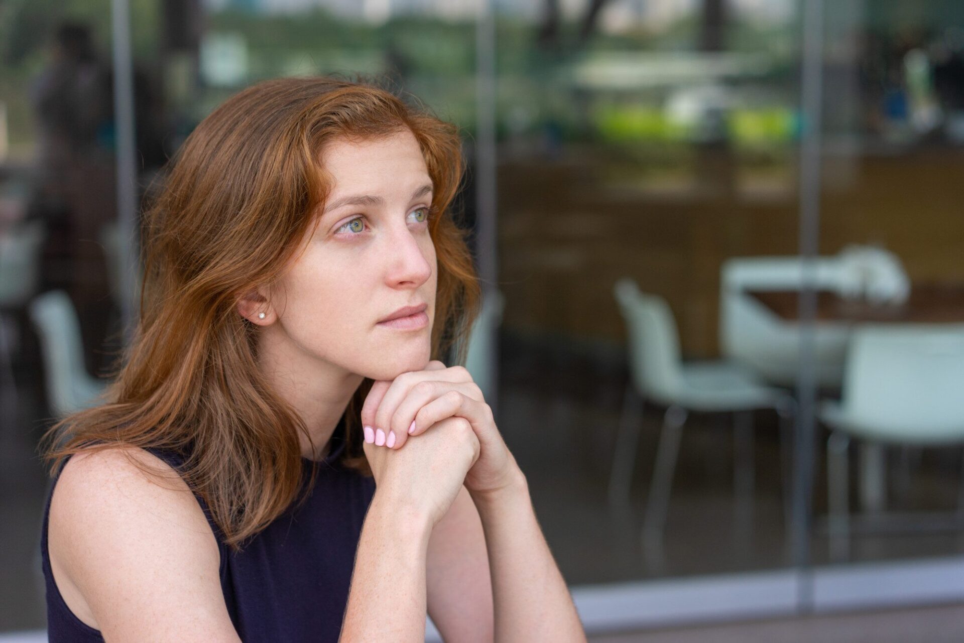 Woman reflecting on memory and concentration changes associated with depression